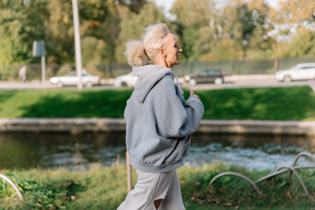 older woman walking to keep fit and healthy